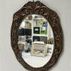 Kuparipeili koristeellisella kehyksellä