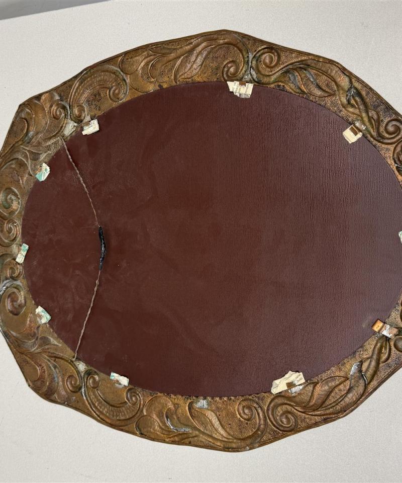 Kuparipeili koristeellisella kehyksellä