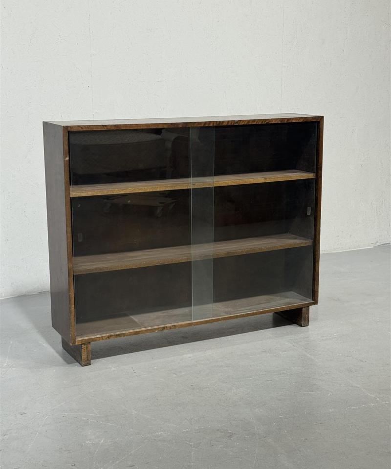 Vintage kirjahylly, lasiliukuovilla