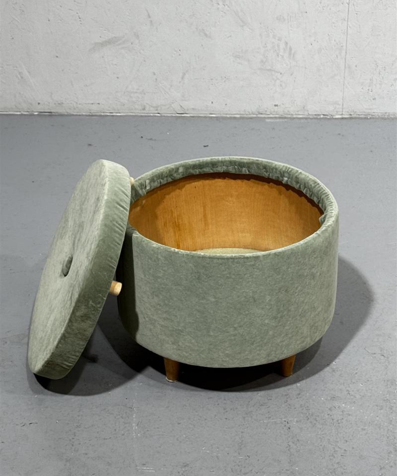 Vihreä samettirahi lokerolla