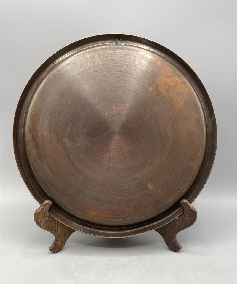 Koristeellinen kuparinen seinälautanen