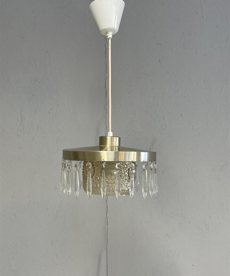 Kattovalaisin kristallikoristeilla