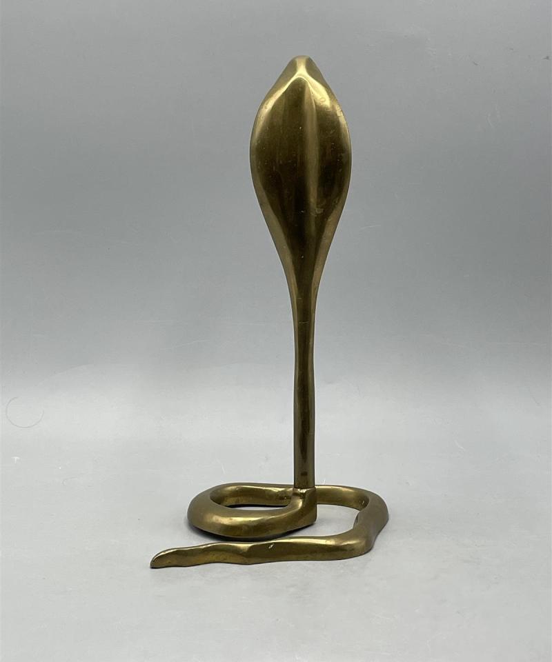Messinkinen Cobra figuuri
