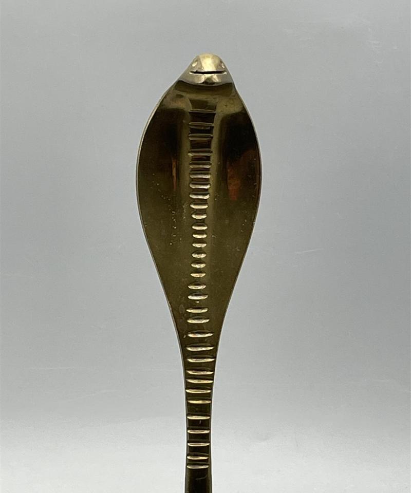 Messinkinen Cobra figuuri