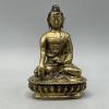 Metallinen Buddha figuuri